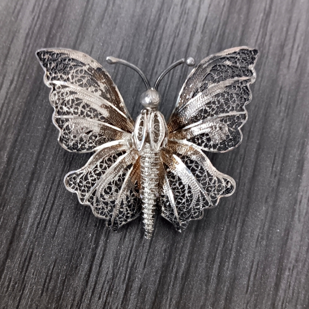 Vintage filigree silver butterfly pin